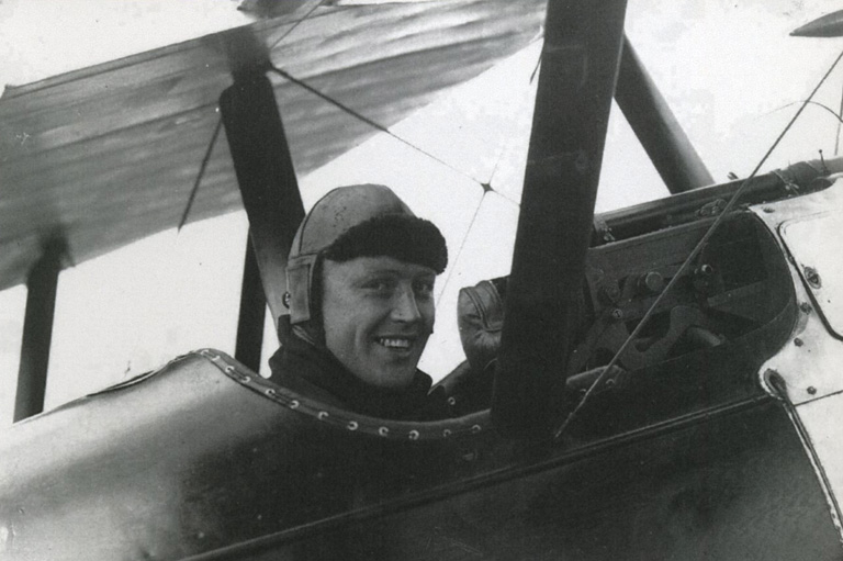 Black and white photo of Raymond Collishaw in the cockpit.