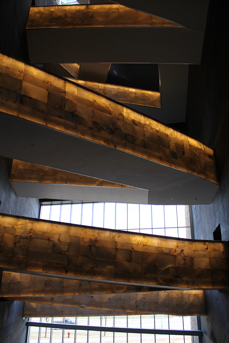 This image shows glowing white alabaster ramps in the Canadian Museum for Human Rights.