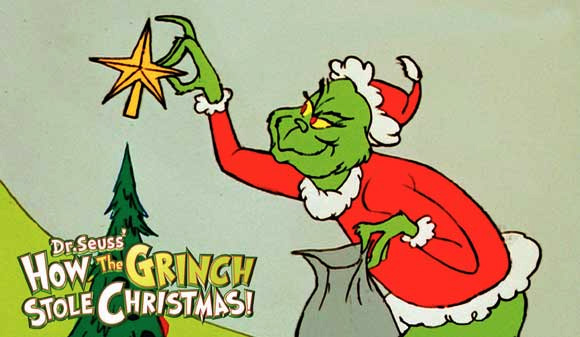 Still shows Grinch placing star on top of Christmas tree.