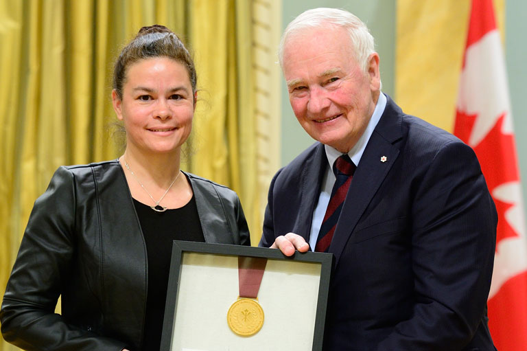 Director Julie Bellefeuille receiving the Governor General's History Award on behalf of the Centre d'archives at Rideau Hall in Ottawa, 2016.