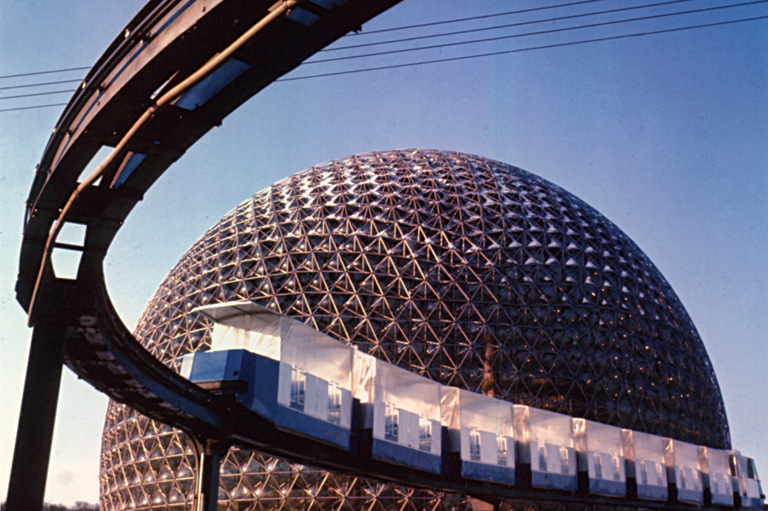 Expo mini-rail glides along in front of the United States of America pavilion.