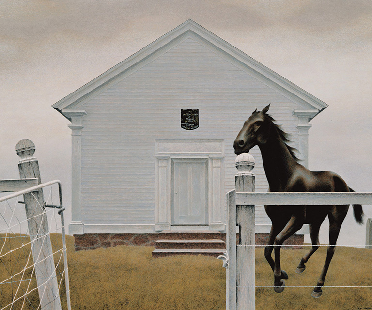 Single building white church in the background with a black horse running towards the viewer. 