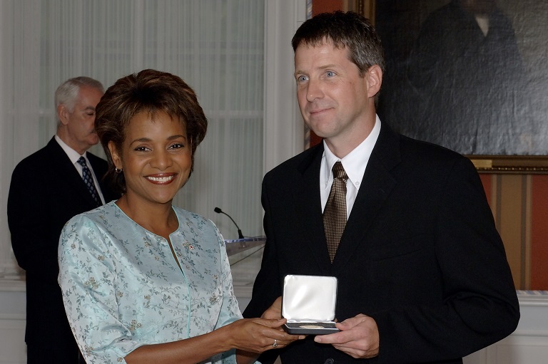 Blake Seward accepting her award at Rideau Hall, 2006.