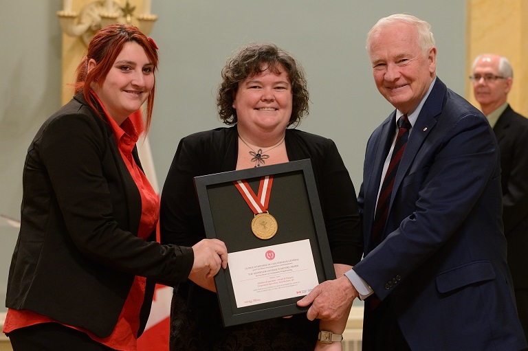 The Spect-Arts Corporation accepting their award at Rideau Hall, 2013.