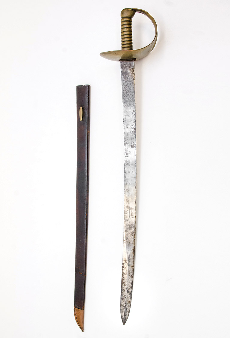 Sword with a handle on the right, and the cover for the sword on the left. 