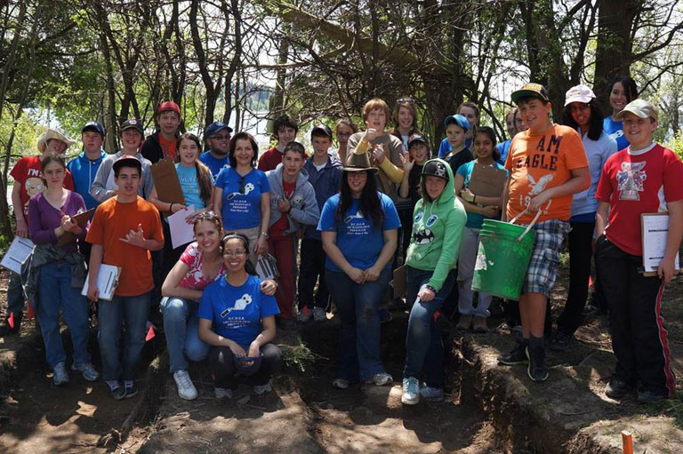 Cathy MacDonald with her students and volunteers.