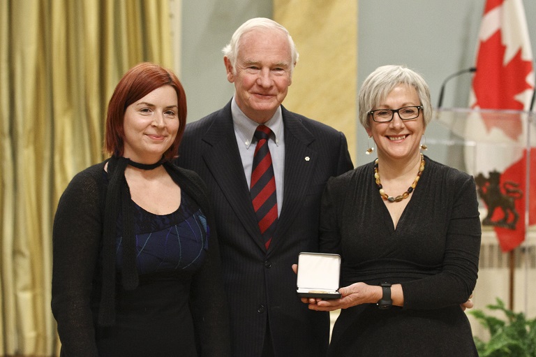 Carol Pauzé and Cybèle Robichaud accepting the award on behalf of the Montréal Science Centre at Rideau Hall, 2011.