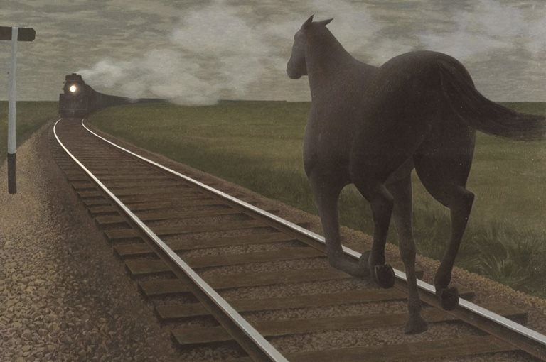 Horse running away from the viewer on train tracks towards a train that is in the distance. 