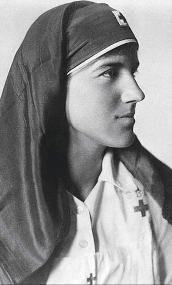 A portrait image of woman in a nursing sister's uniform 